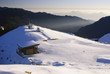wooden shelter with beautiful snow mountain scenic in winter wooden shelter with beautiful snow mountain scenic in winter