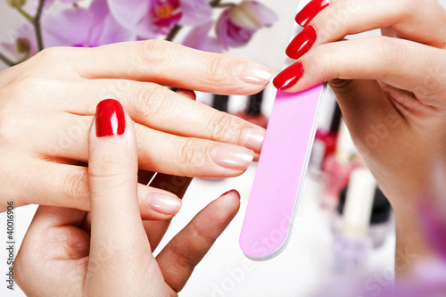 Photo: Gentle care of nails in a beauty salon Gentle care of nails in a beauty salon