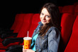 Young girl in cinema watching movie Young girl in cinema watching movie