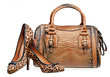 Pair of women shoes and handbag isolated over white