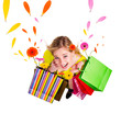 Photo: Happy blond girl with shopping bags in spring concept. Happy blond girl with shopping bags in spring concept.
