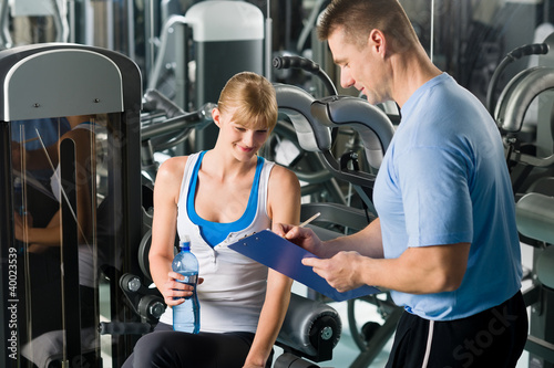 Photo: Completing personal fitness plan with trainer Completing personal fitness plan with trainer