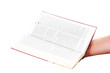 Praying hand hold an open bible