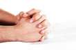 Praying hand hold an open bible