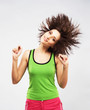 Lovely young woman having fun with shaking her hair Lovely young woman having fun with shaking her hair