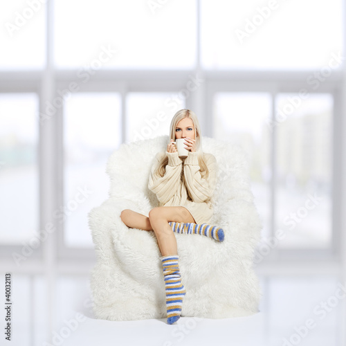 Photo: blonde on furry arm-chair blonde on furry arm-chair