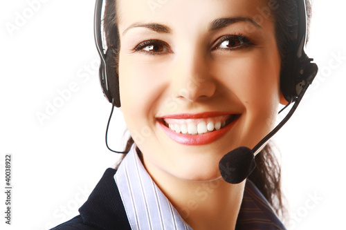 Foto: Smiling woman with headphones isolated Smiling woman with headphones isolated