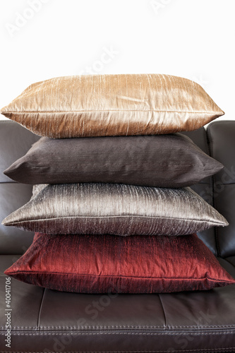 Photo: Cushions on leather sofa Cushions on leather sofa