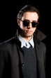 elegant young man in sunglasses