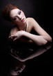 girl at mirror table