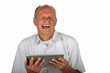 Happy man with his tablet computer