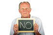 Severe looking man showing a sign with '' NO'" on it