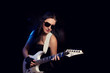 fashion girl with guitar playing hard rock