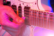 young male musician with a white guitar