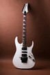 Rock guitar on brown background