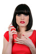 Young woman holding spraycan