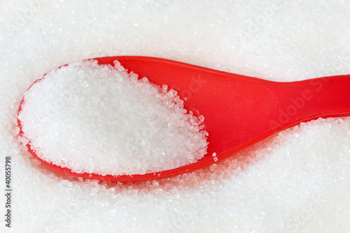 Photo: red spoon with sugar red spoon with sugar