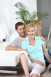 Couple sitting on the floor