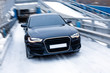 Black Prestigious Car On Snow