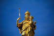 goddess hold baby in arm