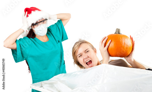 Photo: frightened pathologist in Christmas hat frightened pathologist in Christmas hat