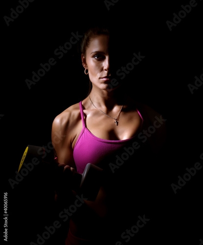 Photo: girl with dumbbells girl with dumbbells