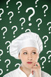 Young female chef  thinking