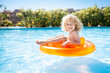 Happy kid swimming in pool Happy kid swimming in pool