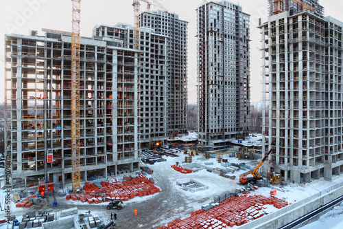 Photo: Five high buildings under construction with cranes Five high buildings under construction with cranes
