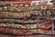 Pile Of Folded Colour Fabrics And Shawls Pile Of Folded Colour Fabrics And Shawls