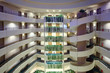 Details der Fotografie Lot of stories in large hotel, spiral staircase