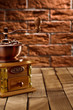 coffee grinder with beans on the table