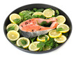 Red fish with lemon, parsley and pepper