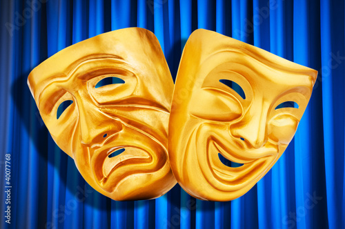 Photo: Theatre performance concept with masks Theatre performance concept with masks