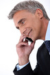 Portrait of executive on the phone