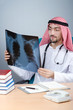 Arab doctor with x-ray print