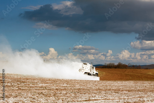 Photo: Truck Spreading Limestone Truck Spreading Limestone