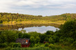 red cabin by the lake