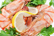 two appetizing tiger shrimps with lemon slice and parsley