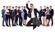 business man holding briefcase jumping in front of his team