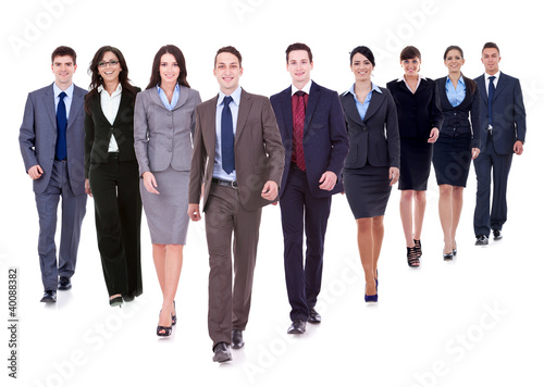 Photo: Successful happy business team walking Successful happy business team walking
