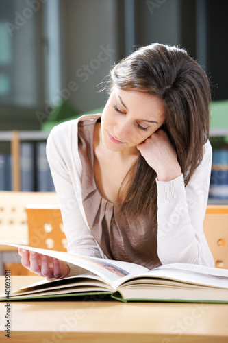 Foto: young woman with book young woman with book