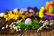 White easter egg on old farmhouse wooden table White easter egg on old farmhouse wooden table