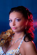 Portrait of the girl on a blue-red background