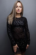 Young sensual & beauty woman in a fashionable dress.