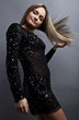 Young sensual & beauty woman in a fashionable dress.
