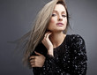 Young sensual & beauty woman in a fashionable dress.