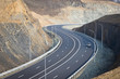 road between the mountains road between the mountains