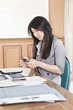 Businesswoman using cell phone
