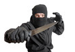 Foto: Masked criminal holding a knife, isolated on white Masked criminal holding a knife, isolated on white